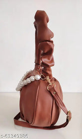 Coral synthetic slingbag with removable & non-removable handles, perfect for everyday essentials